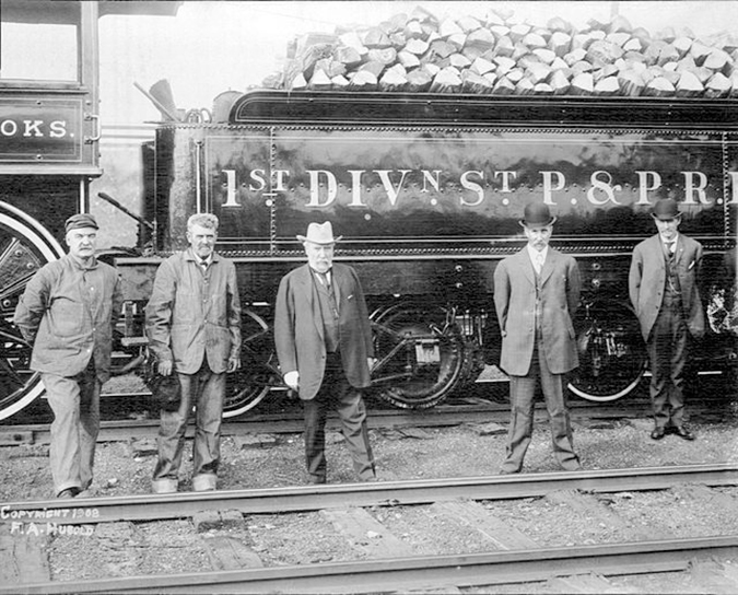 James J. Hill, center 