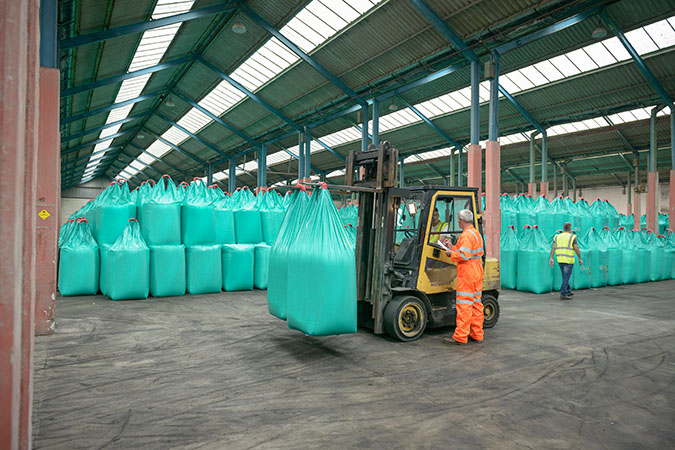 Fertilizer is stored for further blending.  Fertilizer is stored for further blending.