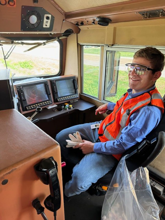 Luke Miller in the locomotive engineer’s seat  Luke Miller in the locomotive engineer’s seat