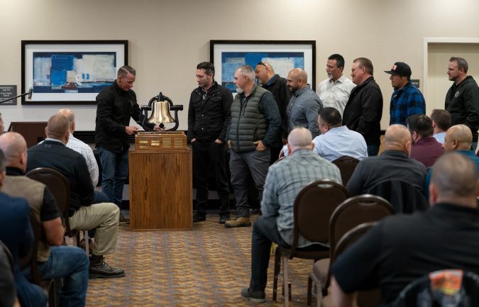 California Division Engineering employees receive their bell.  California Division Engineering employees receive their bell.