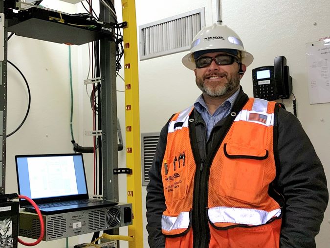 Ryan Holmes at BNSF’s Downer’s Grove microwave site in Illinois.  Ryan Holmes at BNSF’s Downer’s Grove microwave site in Illinois.