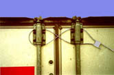Cable Protection Figure: Loop the cable through the upper locking rods, then pull the cable through the lock pad and pull until tight. Cable Protection Figure: Loop the cable through the upper locking rods, then pull the cable through the lock pad and pull until tight.